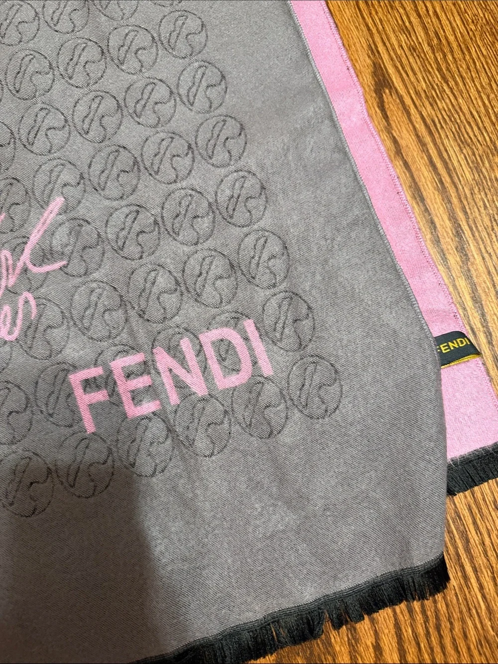 Karl Lagerfeld taupe and pink logo jacquard scarf with fur charm